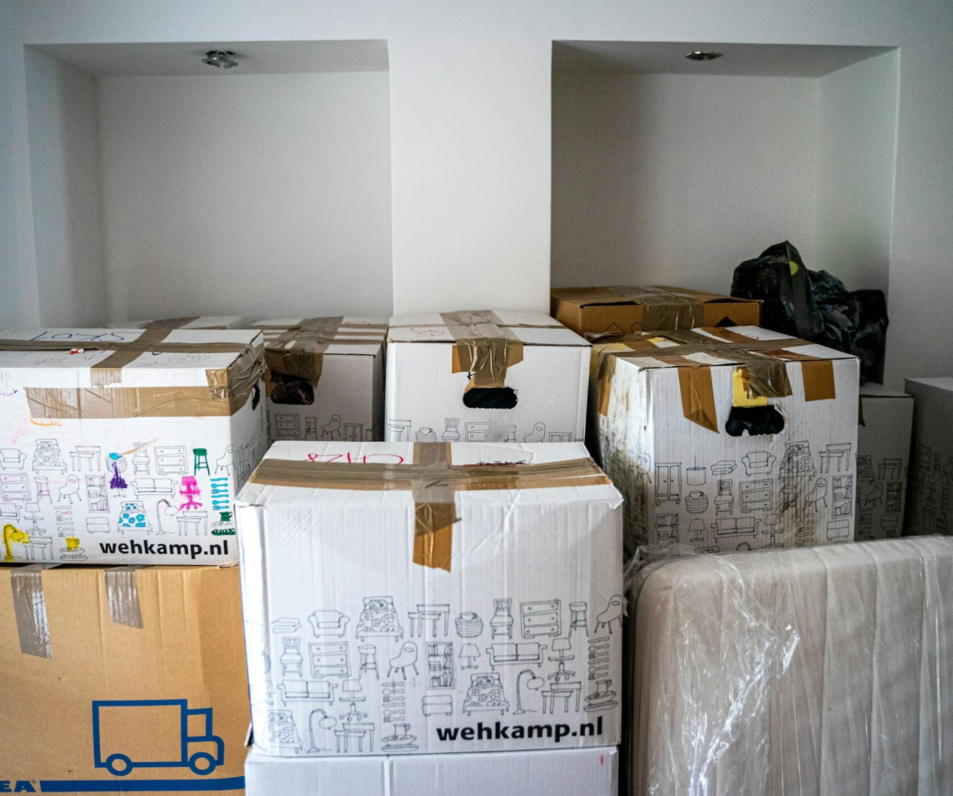 brown cardboard boxes on brown wooden table