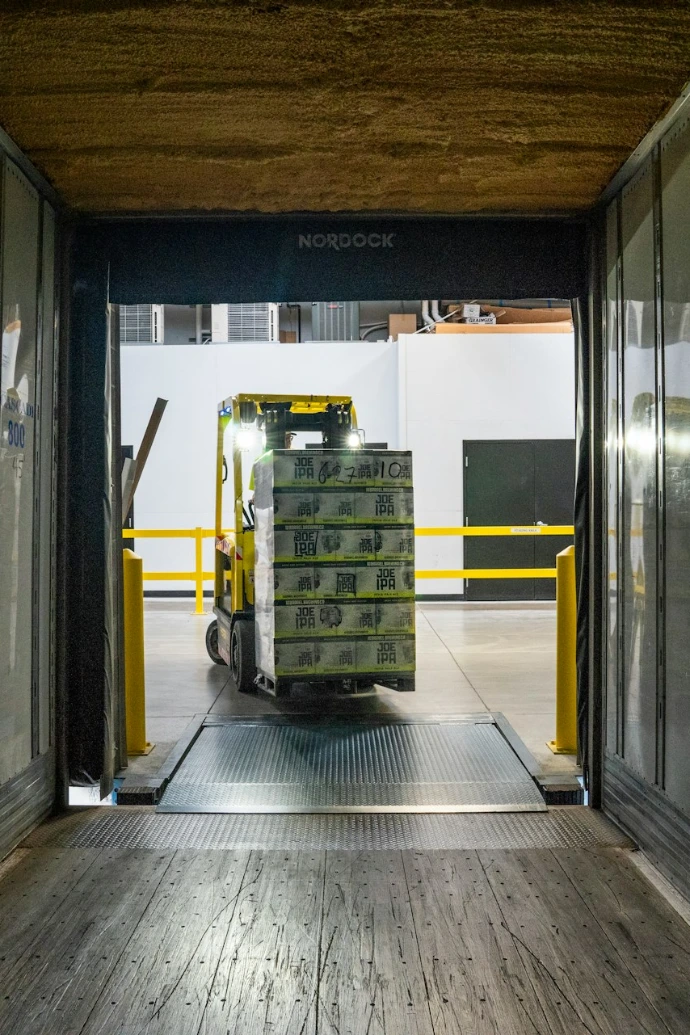 yellow and black forklift during daytime
